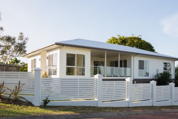 Contemporary house with concrete and timber fence